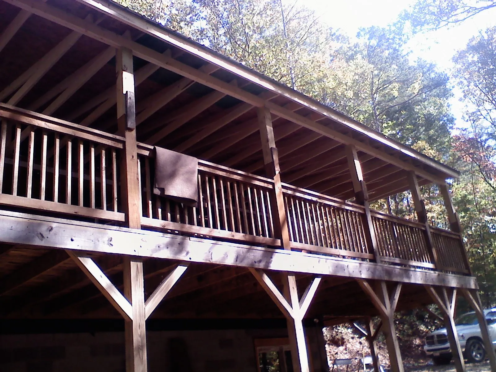 Timber framing under a new elevated porch and deck — Roof Leak Repair in Middlebranch by Roofing Brothers